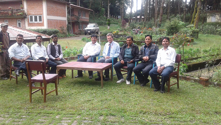 Dr Chris Pearson with surveyors from Nepal's Department of Survey