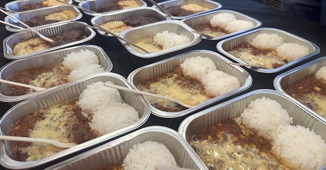 Curry and rice lunch in foil trays
