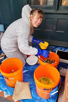 Briar Mills sorts waste at an Otago college.