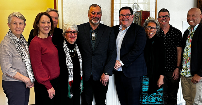 Outgoing Te Ao o Rongomaraeroa Māreikura and Co-Director Jenny Te Paa-Daniel (third right) poses with Te Tumu Dean Patrick Vakaoti (far right), Te Ao o Rongomaraeroa Co Directors Professor Richard Jackson (second right) and Dr Liana McDonald (second left), Vice-Chancellor Grant Robertson (fourth right), and National Peace and Conflict Studies Trustees Marjory Lewis (far left), Sir David Moxon (third left), Janfrie Wakim (fourth left) and Trust chair Maui Solomon (centre). 