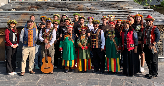 A large group of people standing next to each other