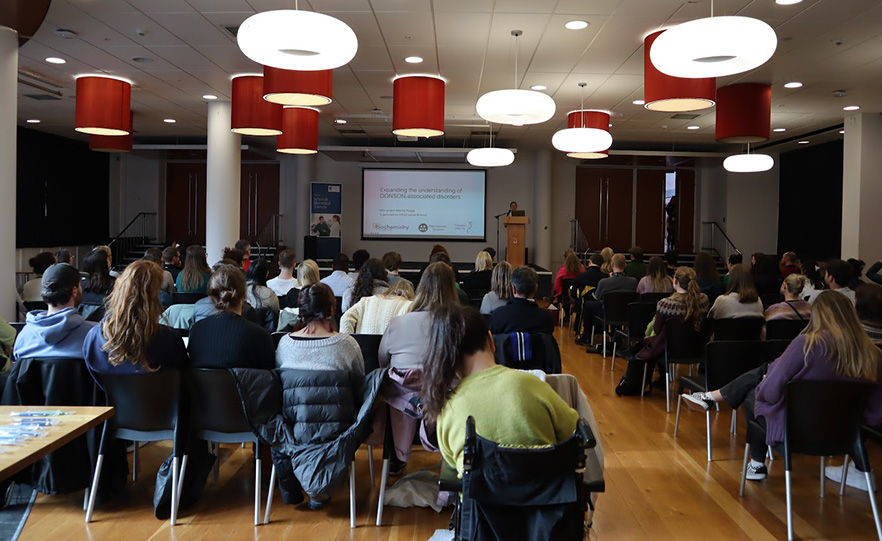 The attentive crowd in the Common Room image