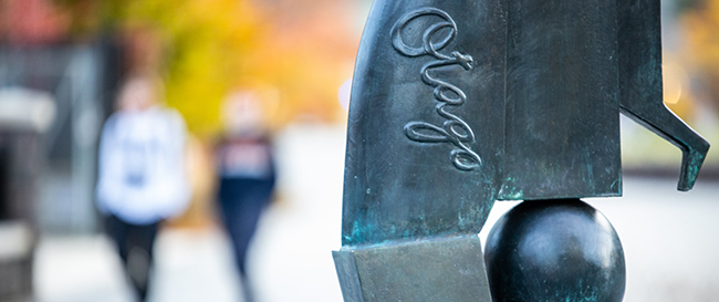 Detail of abstract metal sculpture bearing the word 