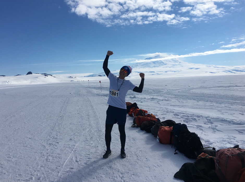 Lead author Dr Sheng Fan after completing the McMurdo Station Marathon 2018-2019 on the Ross Ice Shelf, with Mount Erebus in the background. 