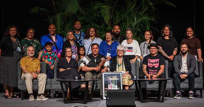 ASPIRE staff Professor Richard Edwards (front, left), Lani Teddy (back row, third from right) and Associate Professor Andrew Waa (front, centre) and partner Wendy Barry on his left with Indigenous and Pacific tobacco control advocates and researchers from Aotearoa, including: Te Rōpū Tupeka Kore chair Whaea Sue Taylor (centre, right), former Te Reo Marama Director Shane Bradbrook (second from right, front row), leading tobacco-resistance Australian academic Raglan Maddox (front, right),