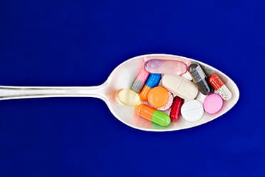 Spoon with pills thumbnail