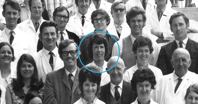Close-up of faces in an old black and white photo, with one face circled in blue (Diana Hill)