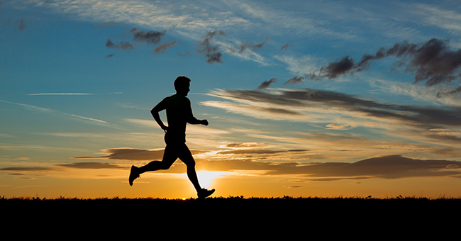 man running at sunset