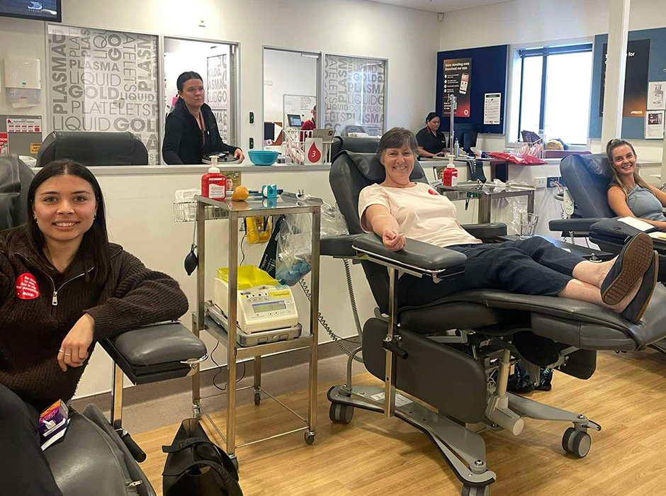 Kaimahi and tauira wait for their turn to donate blood and plasma.  