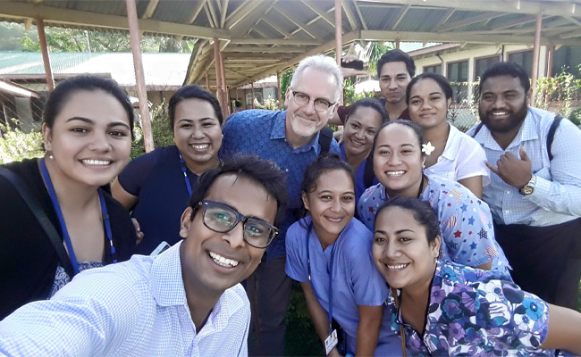 Roshit Bothara (front left) with Professor David Murdoch (third from left, back row) with Samoan medical students, Samoa, 2017.