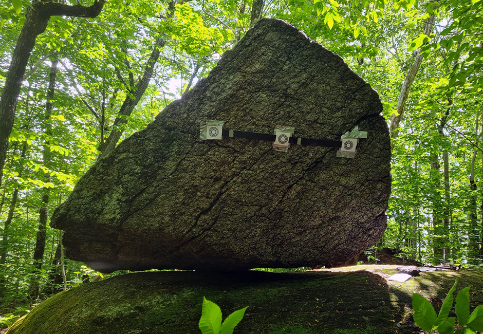 Ancient fragile geologic feature surrounded in green forest