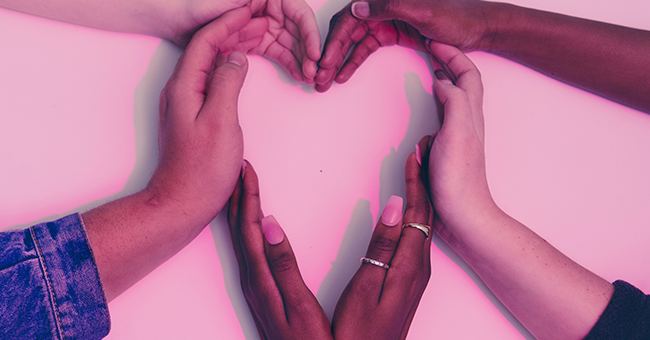 pairs of hands forming a heart shape 