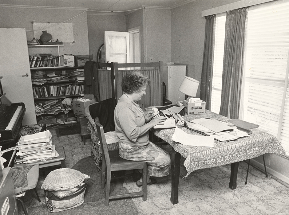 Janet Frame at her desk, Wanganui, 1983. Unidentified photographer, MS-3028/807/004. Hocken Collections, New Zealand Women’s Weekly image