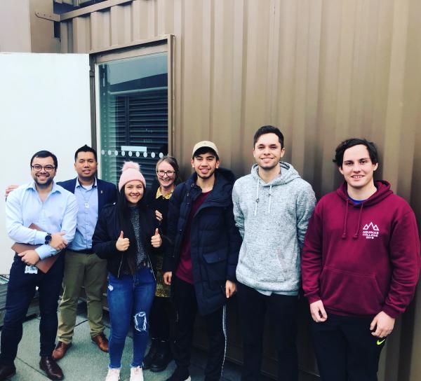 A photo of Dr Aung with Māori and Pasifika students from the Department of Microbiology and Immunology