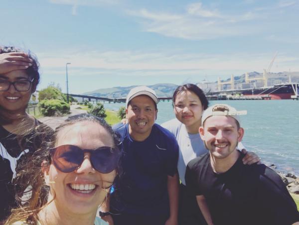 A photo of Dr Aung and some students on a lunchtime run