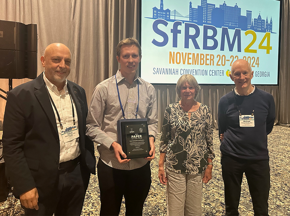 Dr Nick Magon (second from left) and Professor Christine Winterbourn (second from right), alongside 'Redox Biochemistry and Chemistry' journal editors Professor Rafael Radi (left) and Professor Michael Davies (right).