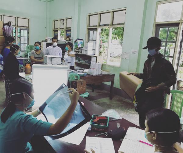 A photo of people in the Tuberculosis Clinic lab, Yangon, Myanmar