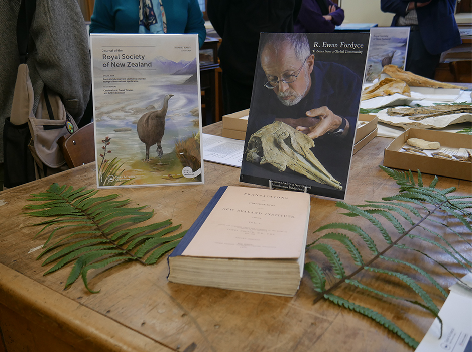 Some of the objects on display at the launch at the Geology Museum, including a copy of the first edition of the journal from 1868 (bottom). 