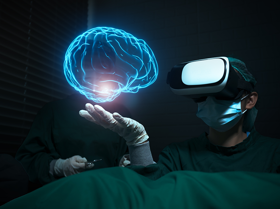 two people in medical scrubs, one wearing an virtual reality headset that has as virtual image of a neon blue brain hovering above their hand